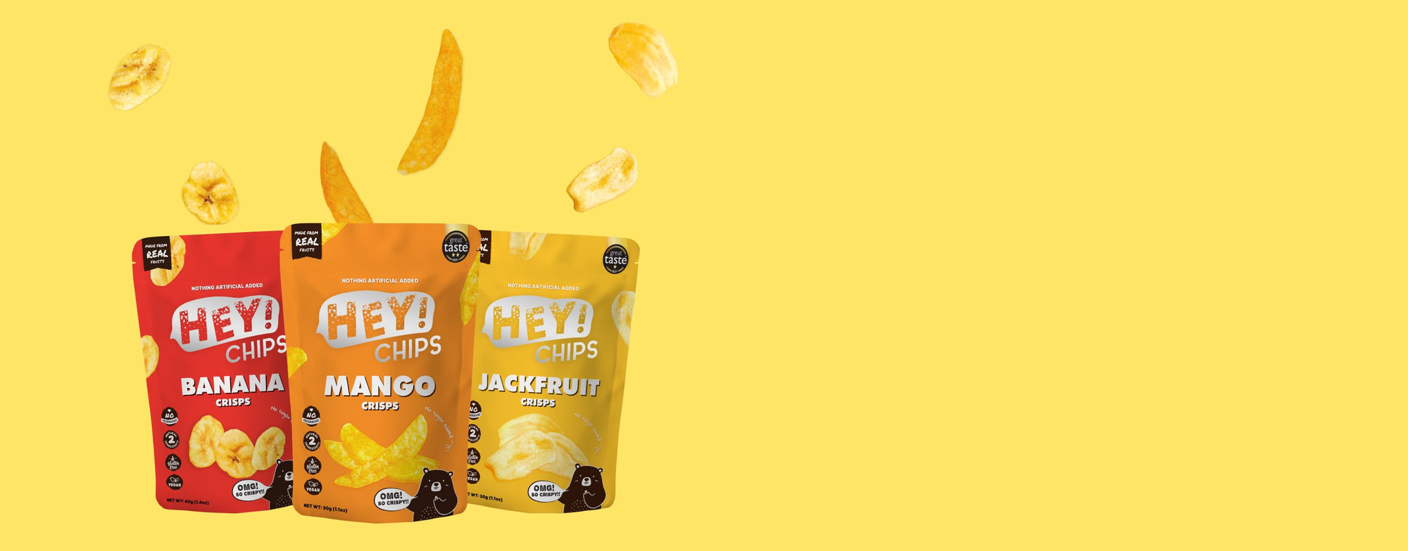 Hey! Chips packs including banana, mango, and jackfruit crisps displayed with the actual crisps on a yellow background.