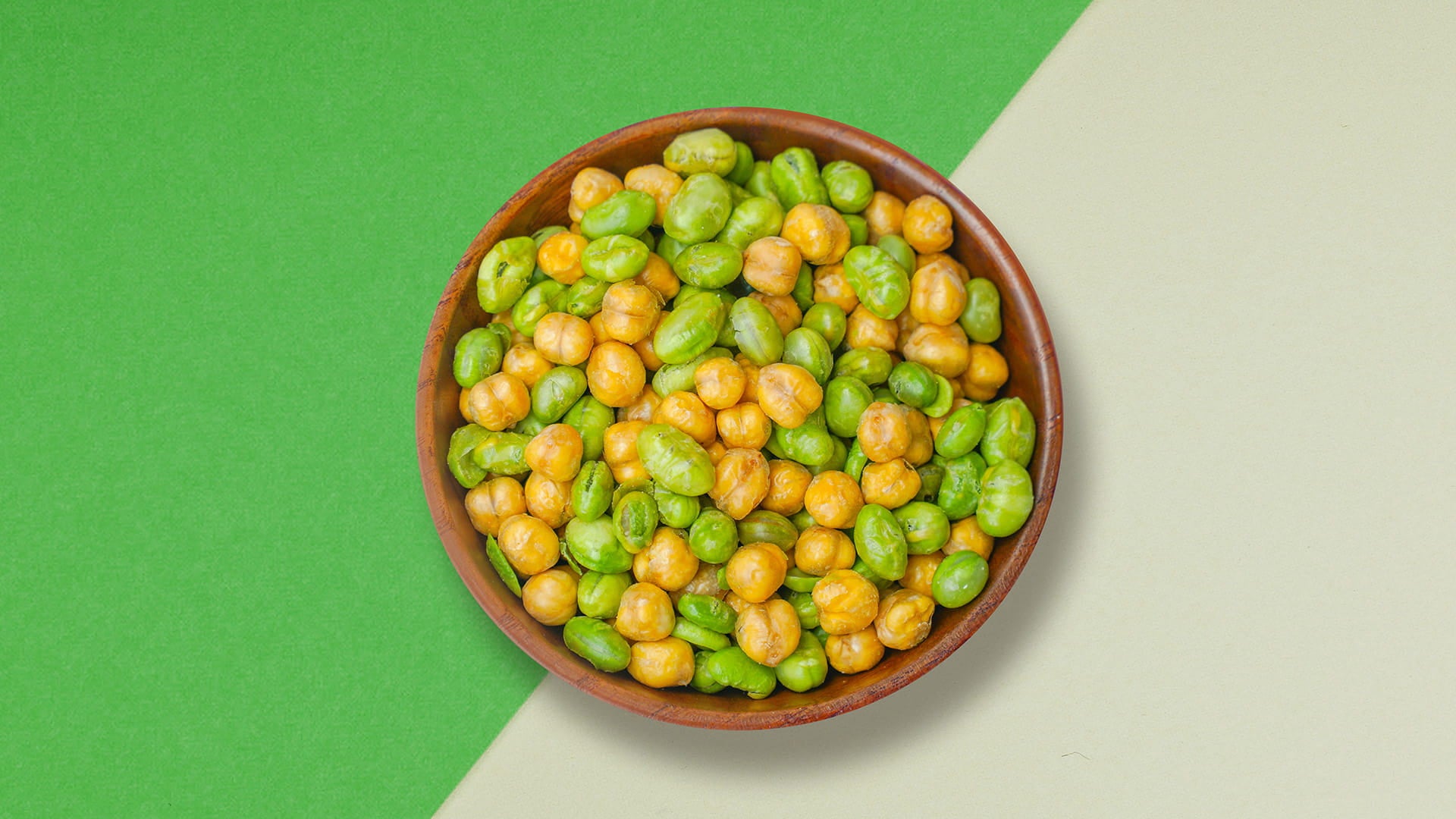 Bowl of Superbeans Edamame and chickpeas on a green and beige background